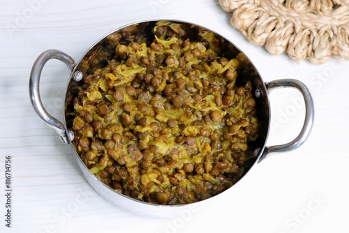 Akkha Masoor is an Indian dish cooked with whole red lentils, spices, onions, tomatoes, garlic, and ginger. Rich, flavorful, and nutritious. Enjoy with rice or bread. masoor usal. masur chi bhaji