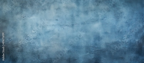 A textured background with a blue cement and concrete design featuring a vignette effect The background offers ample room for text or images © vxnaghiyev