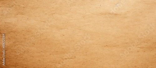 A textured background of recyclable brown craft paper with a cardboard like sheet providing ample space for adding text or images