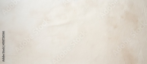 The background is a white beige paper texture with a rough and textured appearance featuring light spots and a blank area for copy space image