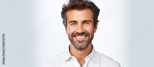 A smiling handsome man in a...