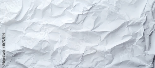 Top view of a clean white paper with a textured background resembling crumpled paper Ideal for use as a copy space image 134 characters