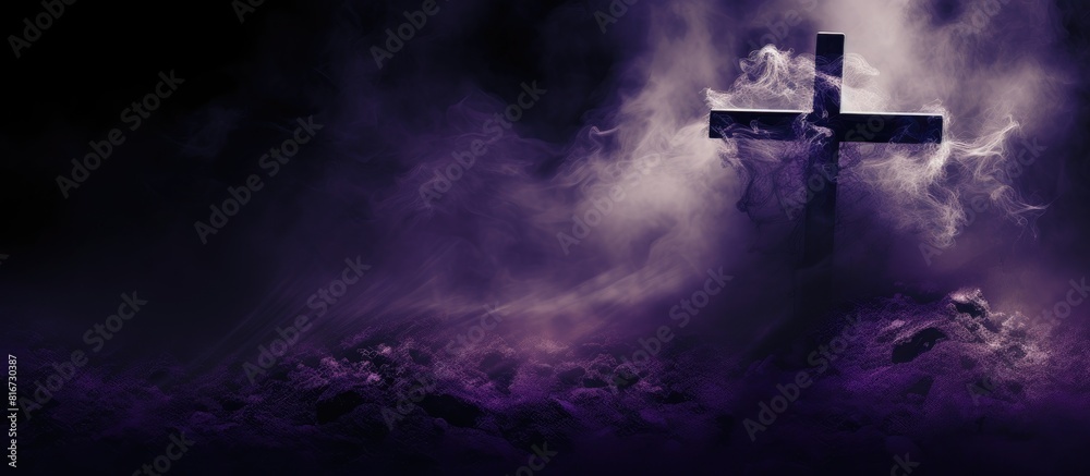 Copy space image of a dark purple background adorned with a cross of ashes Copy space image of a dark purple background adorned with a cross of ashes