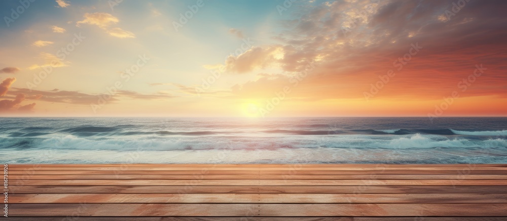 A serene beach scene at sunset showcasing a wooden area and offering plenty of copy space for images