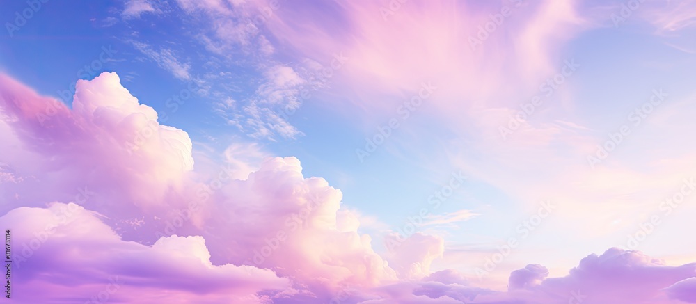 Soft sky with clouds in hues of pink violet and blue creates a serene and colorful atmosphere for a copy space image Soft sky with clouds in hues of pink violet and blue creates a serene and colorful atmosphere for a copy space image