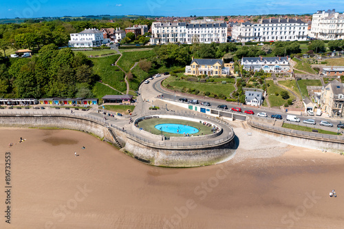 Aerial photo of the beautiful town of Filey in the UK, showing the beach front and open air public swimming pool on a sunny summers day