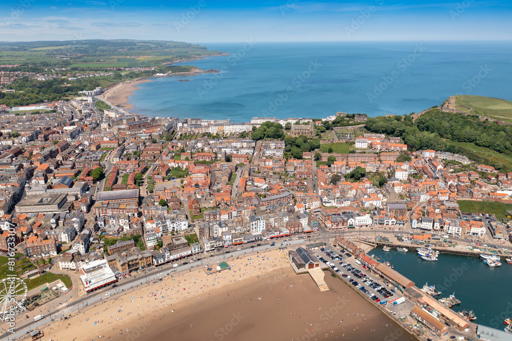 Aerial photo of the beautiful seaside town of Scarborough in the UK showing the beach front on a sunny summers day