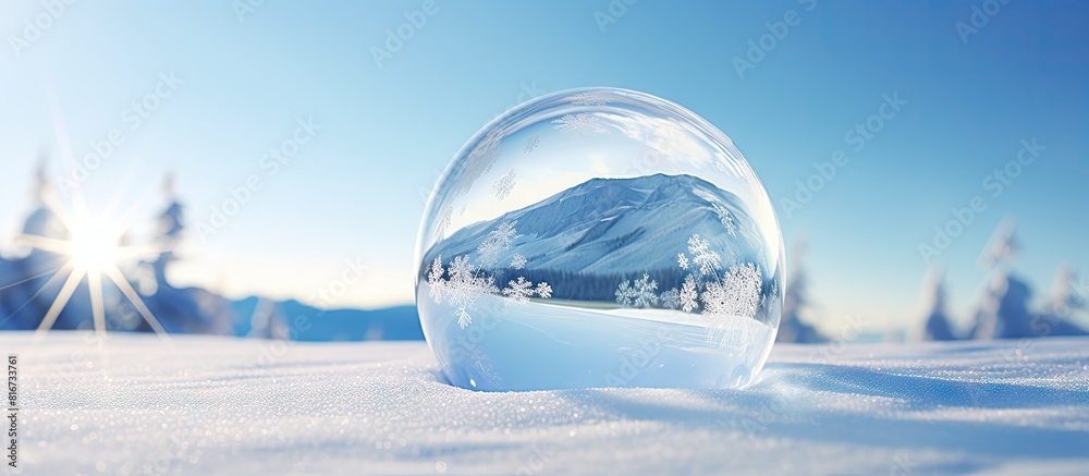 A soap bubble rests gracefully against a backdrop of pristine white snow providing ample room for additional images or text A soap bubble rests gracefully against a backdrop of pristine white snow providing ample room for additional images or text