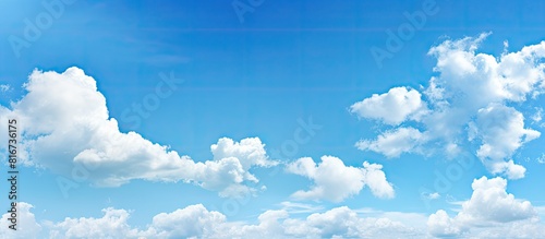A serene and unobstructed scenery of a blue sky providing ample empty space for additional content photo