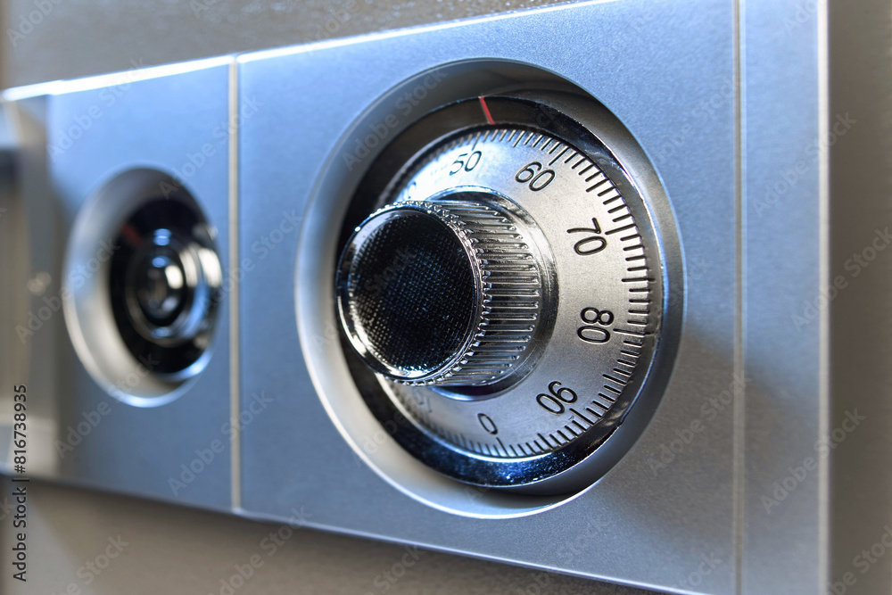 Closeup image of a mechanical safe lock. Closeup image of a mechanical safe lock.