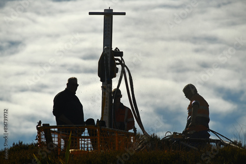 drilling a hole on the summit photo