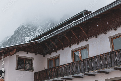 Scenic view of Bavarian Alps buildings in Germany against a dramatic mountain backdrop