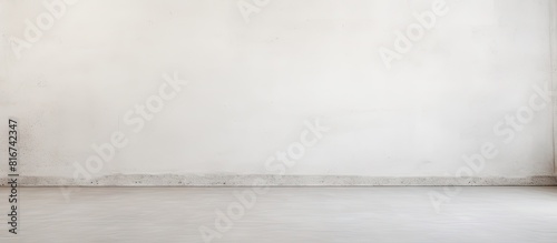 Vintage style copy space image of a white cement wall background perfect for graphic design or wallpaper The retro concept showcases a pattern of soft concrete on the floor