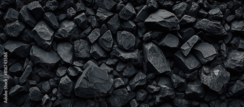 A copy space image of a black stone texture serves as the background