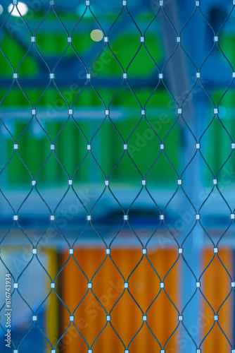 Obraz na płótnie Fence grid, and colorful shipping containers w salonie