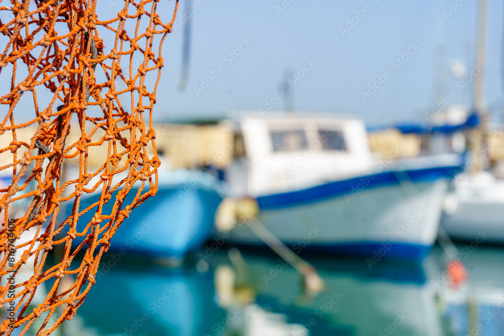 Fishing net and boats, historic port of Jaffa
