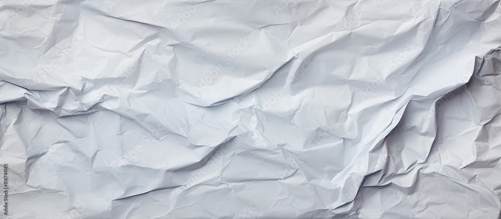 Fototapeta premium A textured sheet of crumpled paper with plenty of space for an advertising message. with copy space image. Place for adding text or design
