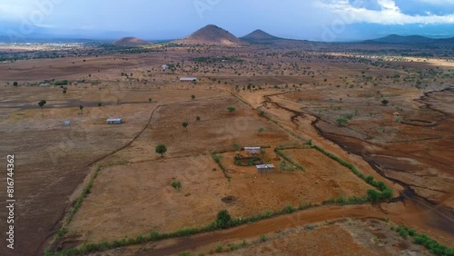Drone footage over the Masaai lands near Arusha city at sunset in East Africa's Tanzania photo