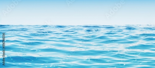 A copy space image of a tranquil blue and white pool water background or an ocean water background
