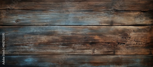 Aged wooden plank background with scratches and a vintage appearance suitable as a copy space image