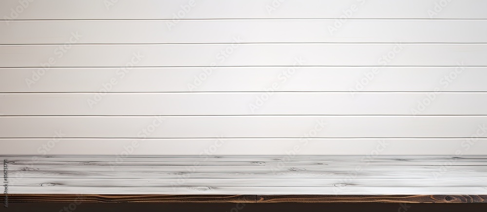 A white wood background frames an empty wooden table providing copy space for displaying text design or products A white wood background frames an empty wooden table providing copy space for displaying text design or products