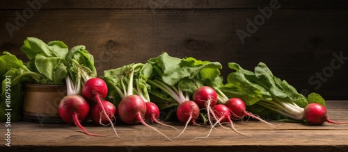 An image of freshly harvested radishes displayed on an aged wooden table with empty space for copying