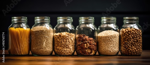 Buckwheat barley and spelt flakes in a jar Organic food ingredients. copy space available