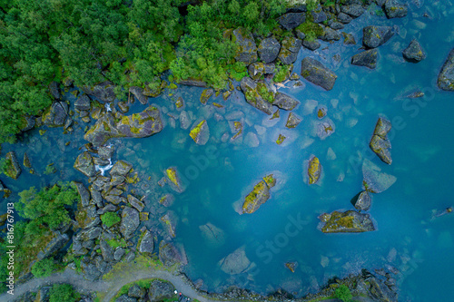Arctic Oasis: Aerial View of Glacial Pond Amidst Norwegian Summer photo