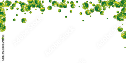 Vitamin Q10 round capsules scattered randomly.
