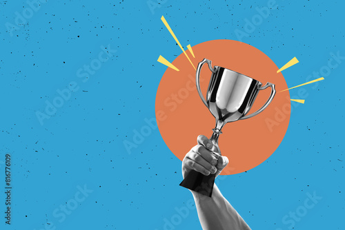 Flat design Illustration. Hand holds and raised cup trophy, holding cup against clean backgrund. award and victory concept photo