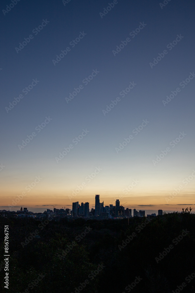 Scenic view of the city skyline of downtown Austin, Texas at sunset Scenic view of the city skyline of downtown Austin, Texas at sunset