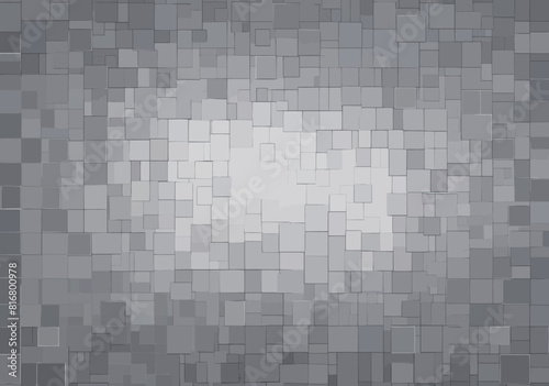 a gray tiled wall with a white square in the middle
