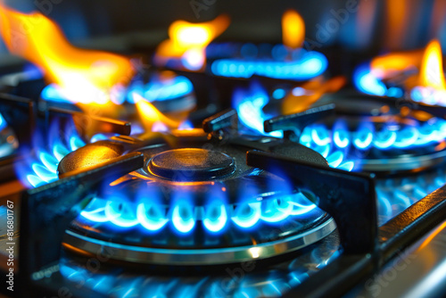 Working gas burner. Close-up photo. Fire and blue natural gas