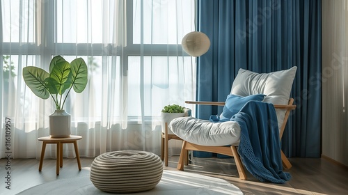 White cozy armchair blue throw blanket cushion near window sheer curtains in sisu modern style living room