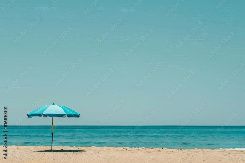 minimalist beach scene with solitary blue umbrella evoking tranquility and solitude against clear sky minimalist beach scene with solitary blue umbrella evoking tranquility and solitude against clear sky
