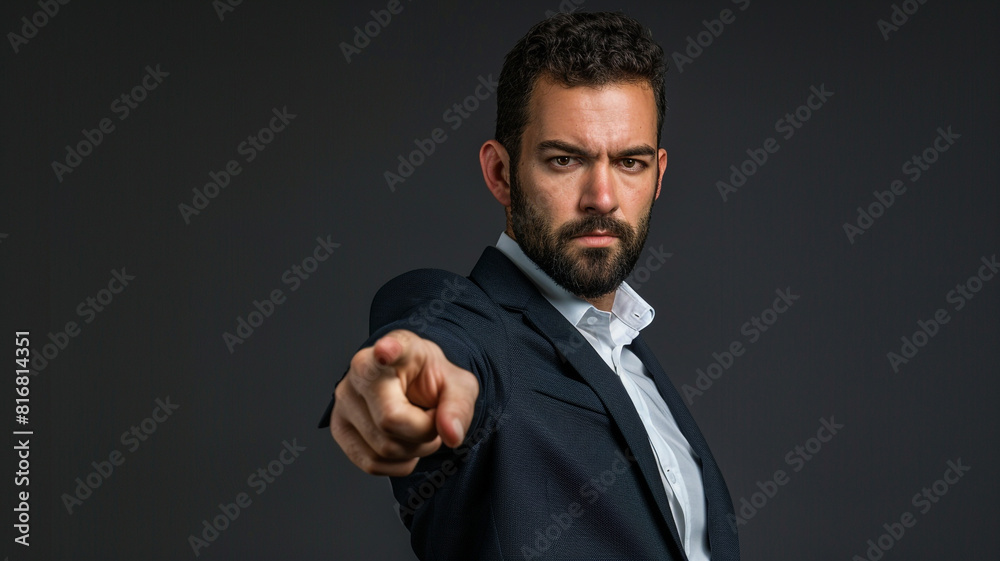close up of businessman pointing finger on a grey background with copy space for your text close up of businessman pointing finger on a grey background with copy space for your text