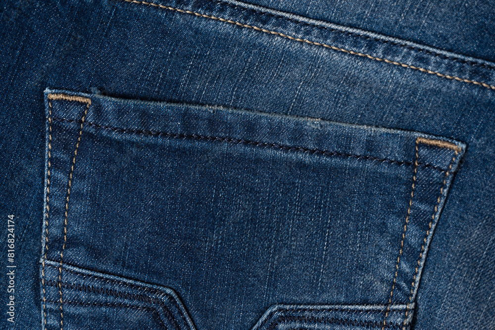 Blue jeans denim texture as a background. Top view. Blue jeans denim texture as a background. Top view.