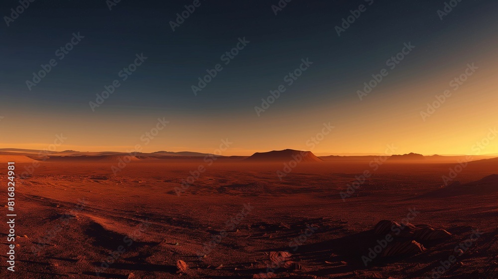Naklejka premium Sunrise over a vast red desert landscape with a clear starry sky.