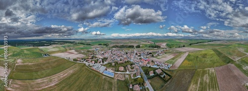 Aerial views of Melque de Cercos in the province of Segovia during a clear day with clouds photo