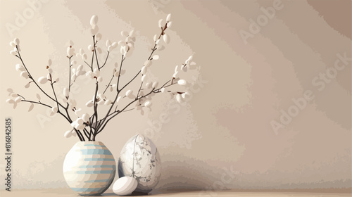 Vase with tree branches and Easter eggs near beige wa photo