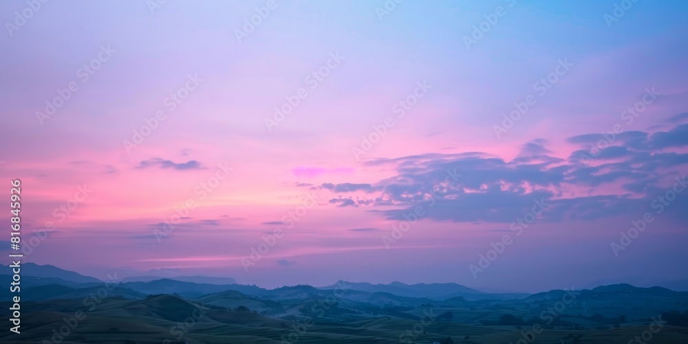 The image shows a beautiful sunset in the mountains