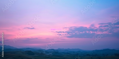 The image shows a beautiful sunset in the mountains