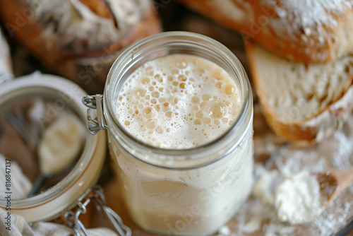 Glass jar with sourdough starter  for bread baking