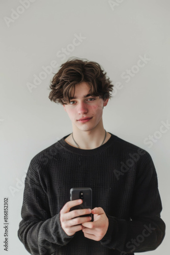 Explore digital connectivity with a medium distance shot of a young man in his 20s holding a smartphone. AI generative.