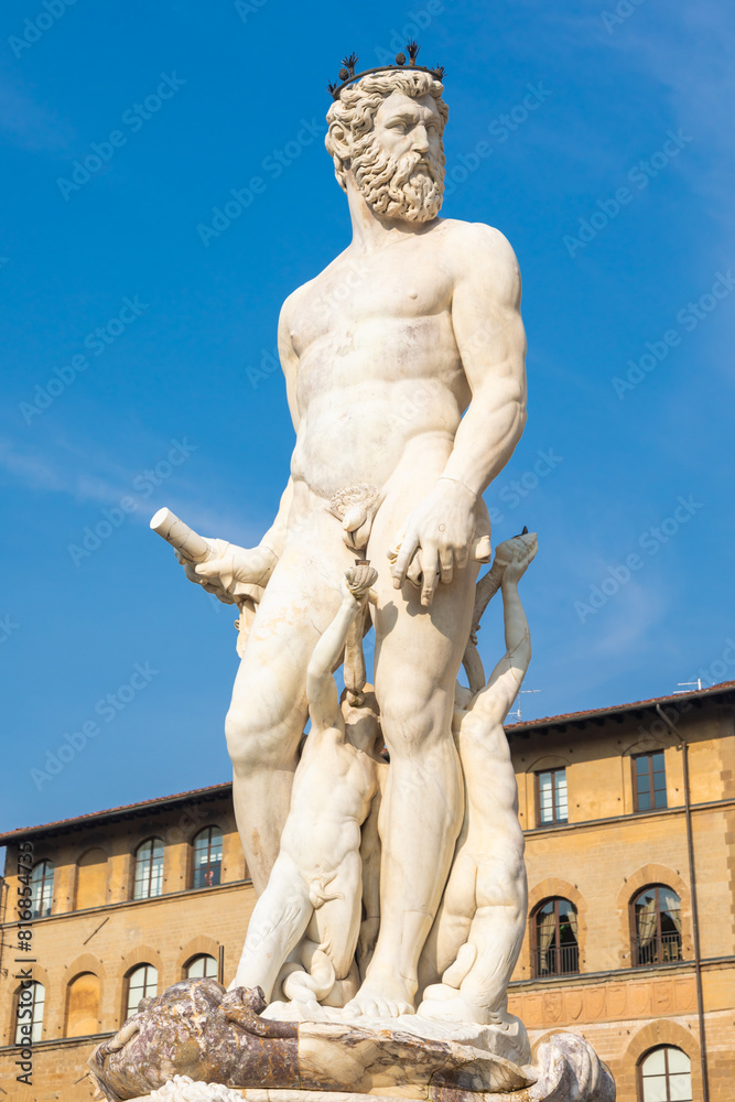 Florence, Italy - Neptune Fountain. Marble sculpture, Renaissance masterpiece, naked Poseidon Florence, Italy - Neptune Fountain. Marble sculpture, Renaissance masterpiece, naked Poseidon