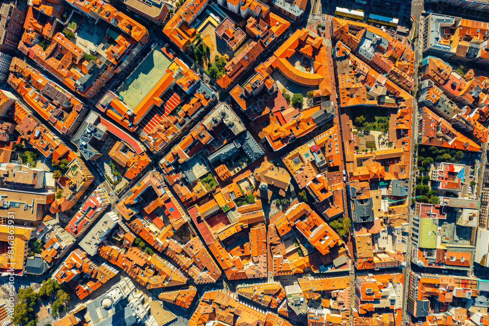 Obraz premium Top view of the ancient houses of old town of Valladolid and Spain. Red roofs of the ancient city