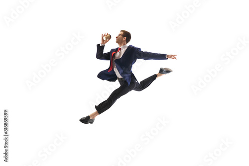 Energetic businessman in mid-leap pose jumping to work, drinking coffee on his way isolated on white background. Employee showing excitement. Concept of business, office lifestyle, motivation
