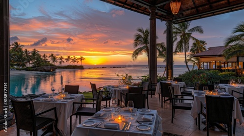 An exquisite beachfront dining experience at sunset in a tropical paradise showcasing a serene ambiance with meticulously set tables and palm trees