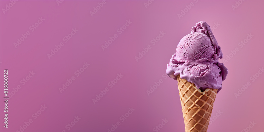 purple ice cream with waffle cone isolated on a purple background, copy space