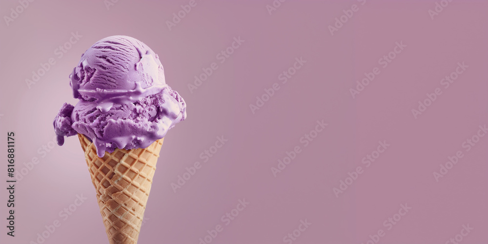 purple ice cream with waffle cone isolated on a purple background, copy space purple ice cream with waffle cone isolated on a purple background, copy space